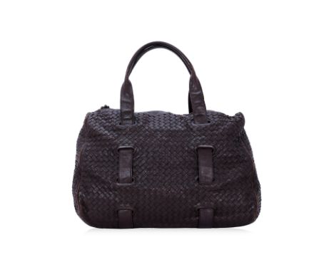 A BOTTEGA VENETA INTRECCIATO BROWN LEATHER DUFFLE BAG
Signature Intrecciato leather in deep brown with gold-tone hardware, ro