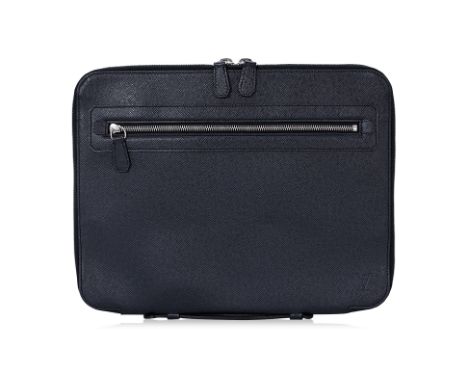 A LOUIS VUITTON TAIGA BLACK LEATHER ATTACHE CASE
Silver-tone hardware, single flat handle at side, dual exterior pockets; one