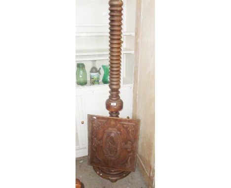 French turned fruitwood standard lamp and a carved oak panel 