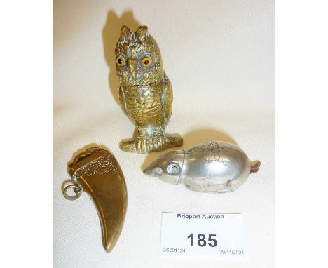 Three vesta cases, a brass owl 'go-to-bed' style with glass eyes, a copper boar's tusk and a white metal mouse