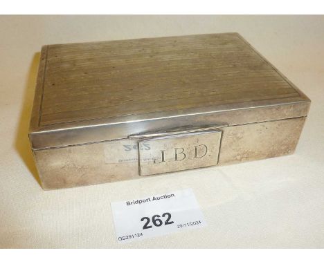 Teak-lined cigarette box with engraved initials to front, hallmarked for Birmingham 1926, maker William Hutton &amp; Sons Ltd