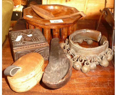 Tribal Art: A small Samoan wooden bowl on legs, a Plains Indian wooden ladle, African carved wooden spoon, a Maori wooden box