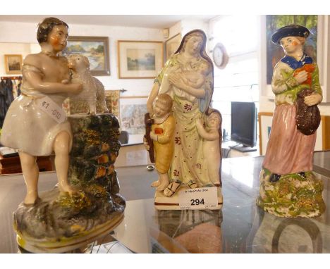 Three 19th c. Staffordshire figure groups, inc. Madonna and children, etc.