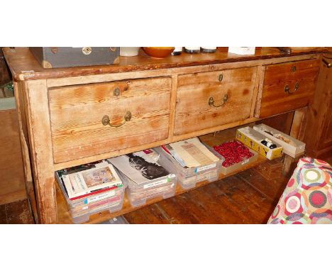 Georgian pine potboard dresser base having 3 large drawers and brass swan neck handles with 3 shelf upper section 