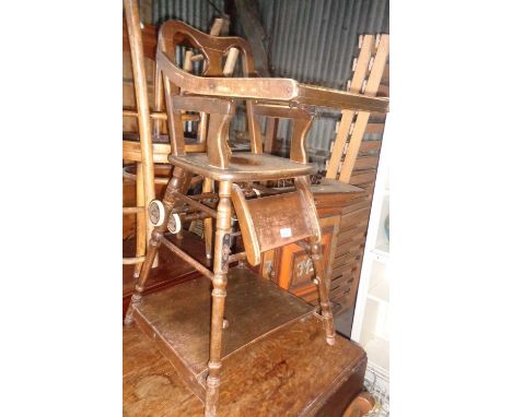 Victorian child's high chair which converts to chair on wheels and tray with abacus