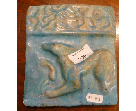 Early Persian turquoise glazed tile of a dog 17cm x 15cm 
