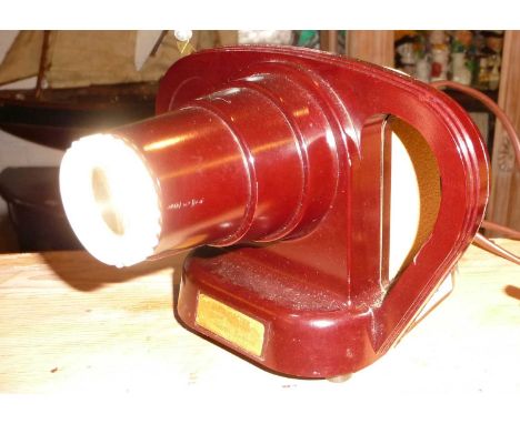 A Bakelite Viewmaster Junior Projector c. 1950's with three slides and instructions