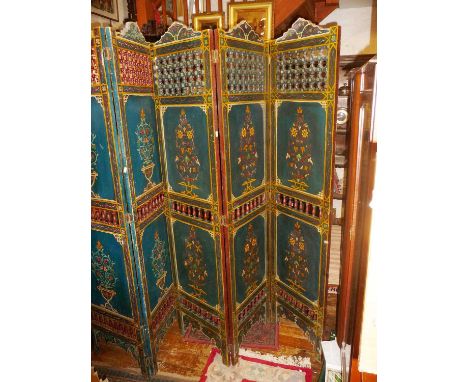 A fine pair of vintage Moroccan painted wood three fold screens with turned decorated panels 135cm wide when extended x 184cm