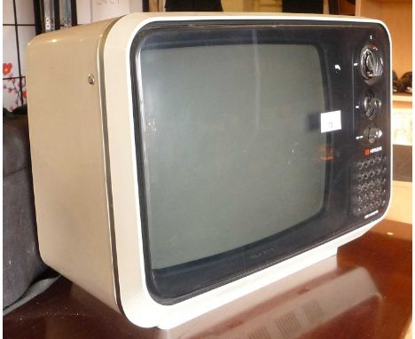 A vintage 1970s Hitachi portable TV Model No F.54G-311