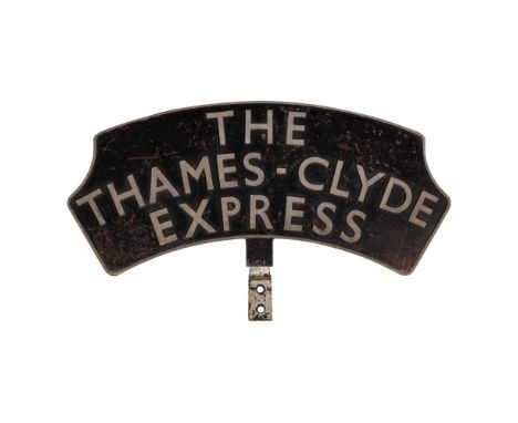 The Thames-Clyde Express Locomotive Headboard  Cast aluminum plaque having a black field with raised silver lettering and a h