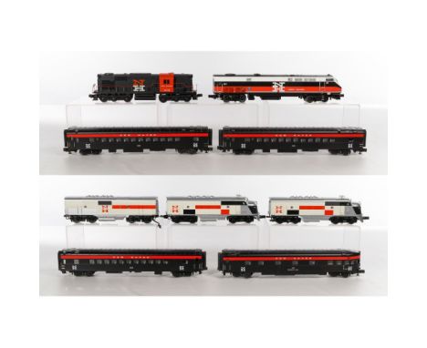 MTH Model Train O Scale New Haven Assortment  (4) items including a 3-piece New Haven set having twin ALCO AA diesel locomoti