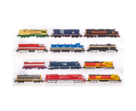 MTH Model Train O Scale Locomotive Assortment  (12) items including a #21 Monon, a #44 Peabody, a #318 Green Bay Route, a #62