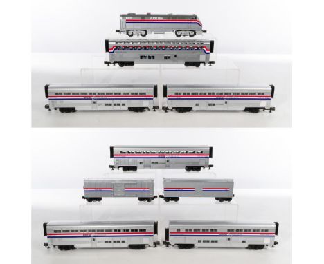 MTH Model Train O Scale Amtrak Passenger Car Collection  (9) items including a Genesis diesel locomotive #805, a lounge car /