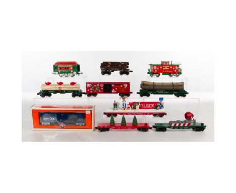 Model Train O Scale Assortment  Over (50) items including logging cars, freight cars and holiday-themed cars by makers MTH, L