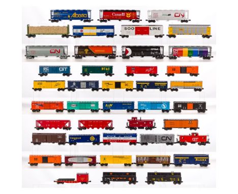 Lionel Model Train O Scale Car Assortment  (42) items from a variety of railroads and companies including boxcars, tank cars,