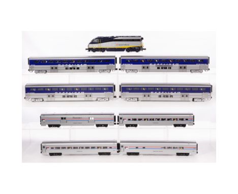 K-Line Model Train O Scale Amtrak Assortment  (9) items including a #2001 locomotive as well as passenger cars including (2) 