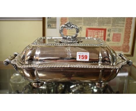 A Georgian Old Sheffield plate entree dish and warming stand, decorated gadrooned rim and engraved crest, 37cm handle to hand