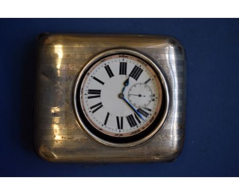 A nickel plated Goliath watch, having white enamel dial decorated Roman numerals and subsidiary seconds dial, case 68.8mm, ho