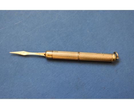 A 9ct gold engine turned toothpick, 6.5g. 