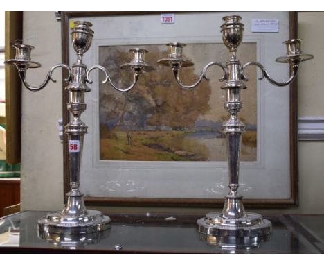 A pair of Old Sheffield plate twin branch candelabra, 40cm. 