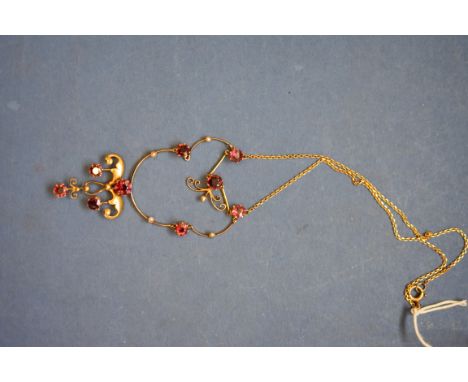 An Edwardian 9ct gold amethyst and pearl necklace. 
