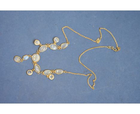 An Edwardian moonstone necklace,&nbsp;on an unmarked fine gold chain. 