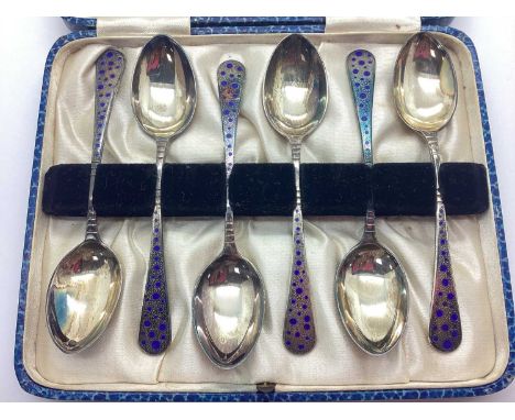 A Set of Six Hallmarked Silver Teaspoons, M.I, Sheffield 1947, of textured finish and highlighted with blue enamel, in a fitt