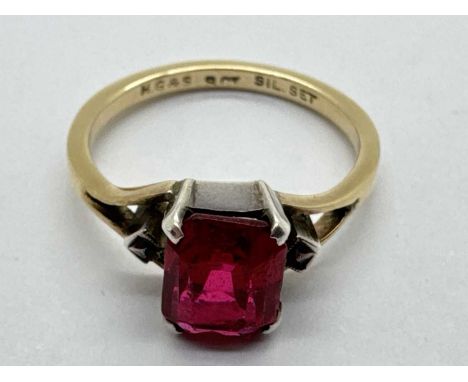 A Vintage Style Stone Set Dress Ring, the centre stone four claw set between marcasite set bifurcated shoulders, to band stam