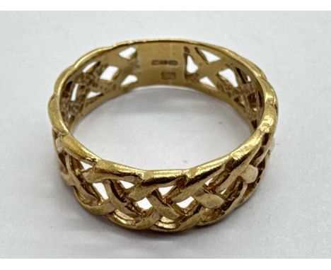 A 9ct Gold Celtic Style Band, of weaved openwork design, (finger size P1/2) (3grams).