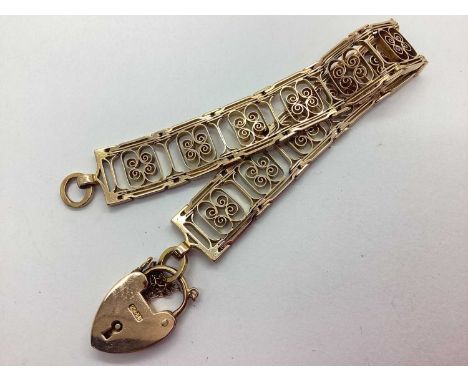 Charles Daniel Broughton; A Victorian Fancy Link Openwork Panel Bracelet, of filigree scroll design, stamped "9C CDB", to hea