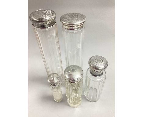 A Collection of Hallmarked Silver Topped Dressing Table Jars, to include Birmingham 1924, of engine turned design, Birmingham