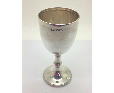 A Hallmarked Silver Goblet, Walker &amp; Hall, Sheffield (date letter rubbed), of plain form, 10.9cm high (58grams).