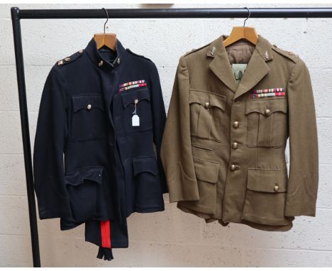 2 uniforms together with a tin trunk belonging to Major J.W Pogmore which includes 2 citations signed by King George VI 2 men