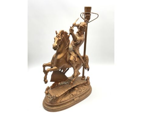 A table lamp modelled as a knight upon horseback, the base titled 'The Norman', with copper coloured finish, overall H52cm.Cl