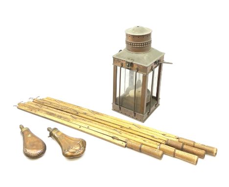 Four beech newspaper holders, each with spring loaded split and pinned blade, turned handle and suspension hook, longest 80cm