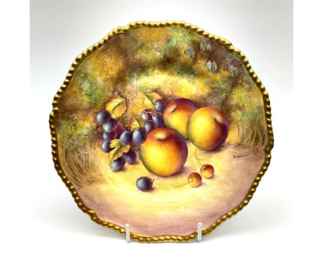 A Royal Worcester fruit painted cabinet plate, hand painted with apples and grapes against a mossy ground, signed S Weston, b