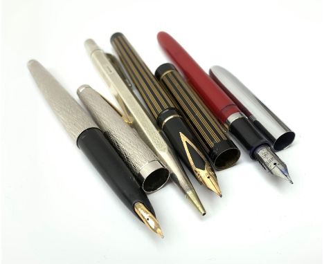 Three Sheaffer fountain pens, comprising a Lady Sheaffer fountain pen with bark effect decoration to body and nib marked 14K,
