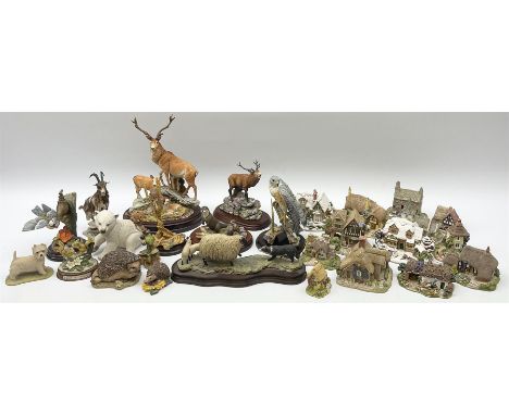 A group of figures, to include Border Fine Arts Blackfaced Ewe and Border Collie no105 by Ray Ayres, Border Fine Arts Red Sta