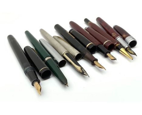 A Croxley Dickinson fountain pen, with black resin body, lever fill action and nib marked 14ct, together with two Waterman's 