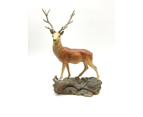 A Beswick Connoisseur matt model of a Stag upon a rocky modelled base, 2629Click here to view further images, condition repor