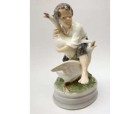 A Royal Copenhagen figure modelled as a boy and two geese, model no 2139, H17cm.Click here to view further images, condition 
