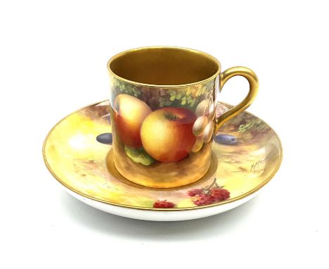 A Royal Worcester fruit painted cabinet coffee can and saucer, hand painted with apples, grapes and raspberries upon a mossy 