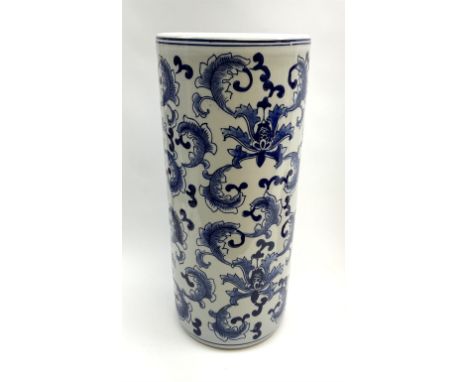 A blue and white stick stand, with Oriental style foliate decoration, H34cm. Click here to view further images, condition rep