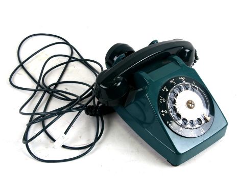 A French Socotel S63 two-tone green dial telephone with speaker.