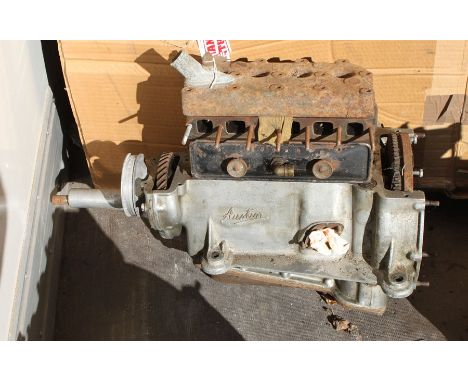 An Austin 7 engine, engine number M204204, internal condition unknown.