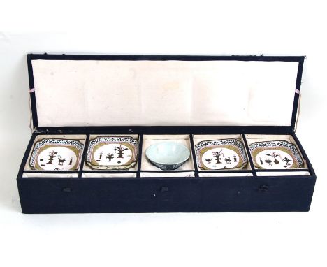A set of four Chinese Canton enamel dishes decorated vases on a white ground with blue &amp; white shallow bowl, boxed, each 