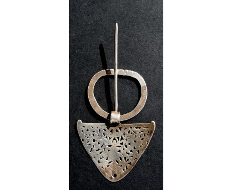 A white metal cloak pin possibly Middle Eastern