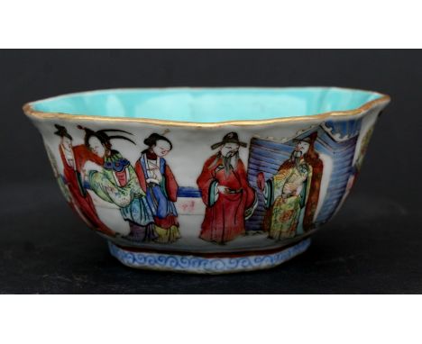 A Chinese famille rose bowl decorated with figures, red seal mark to the underside, 14cms (5.5ins) diameter.Condition ReportG