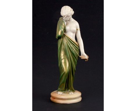 A Royal Worcester figure 'Sorrow' with puce mark and numbered 2/57 to the underside, 24cms (9.5ins) high. Condition ReportVer
