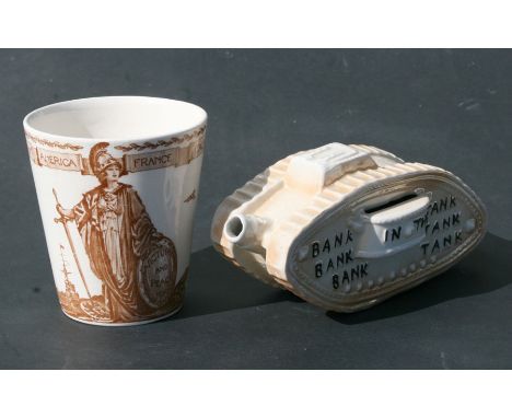 A WW1 ceramic Tank Money Bank 16.5cms (6.5ins) long together with a WW1 Royal Doulton (RD No. 666160) Great Britain and Her G
